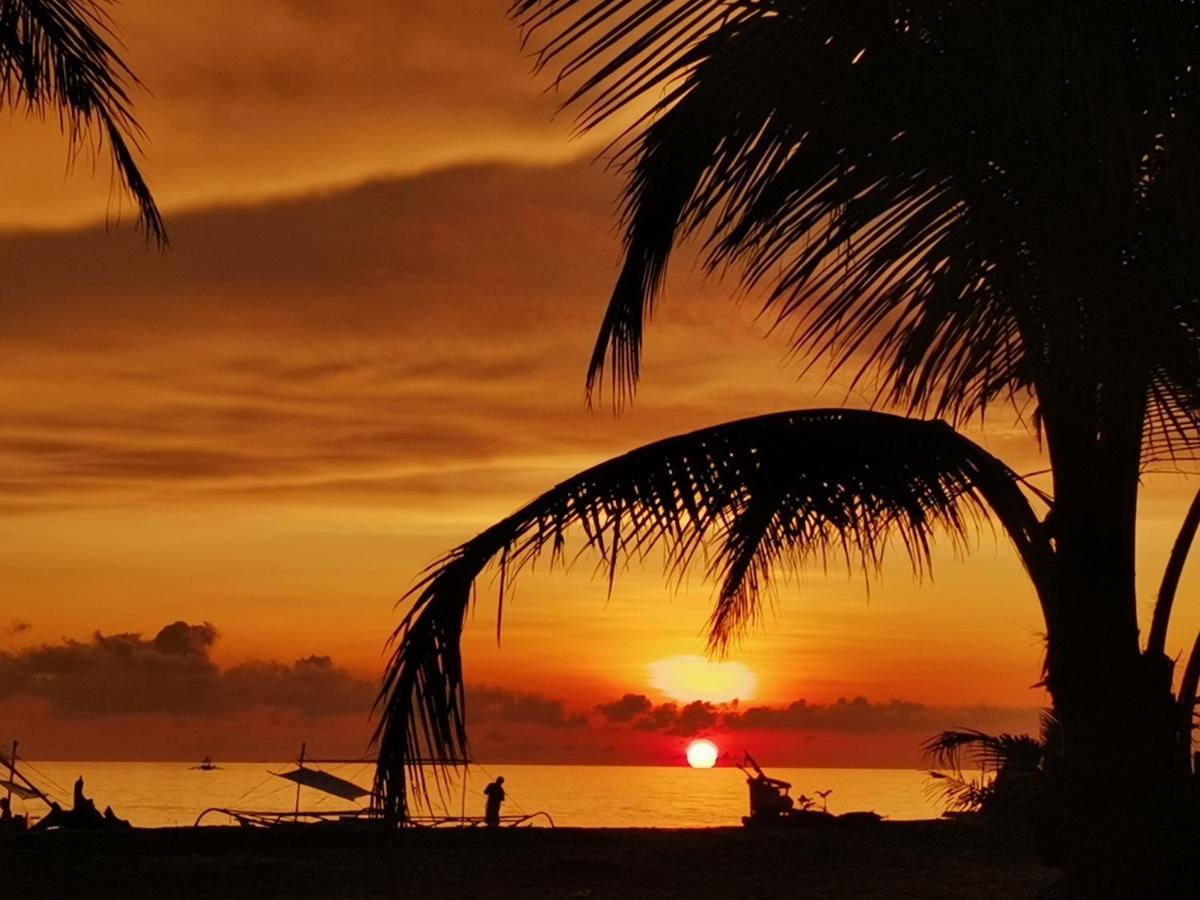 Sulu Sunset Beach Resort Nauhang Bagian luar foto