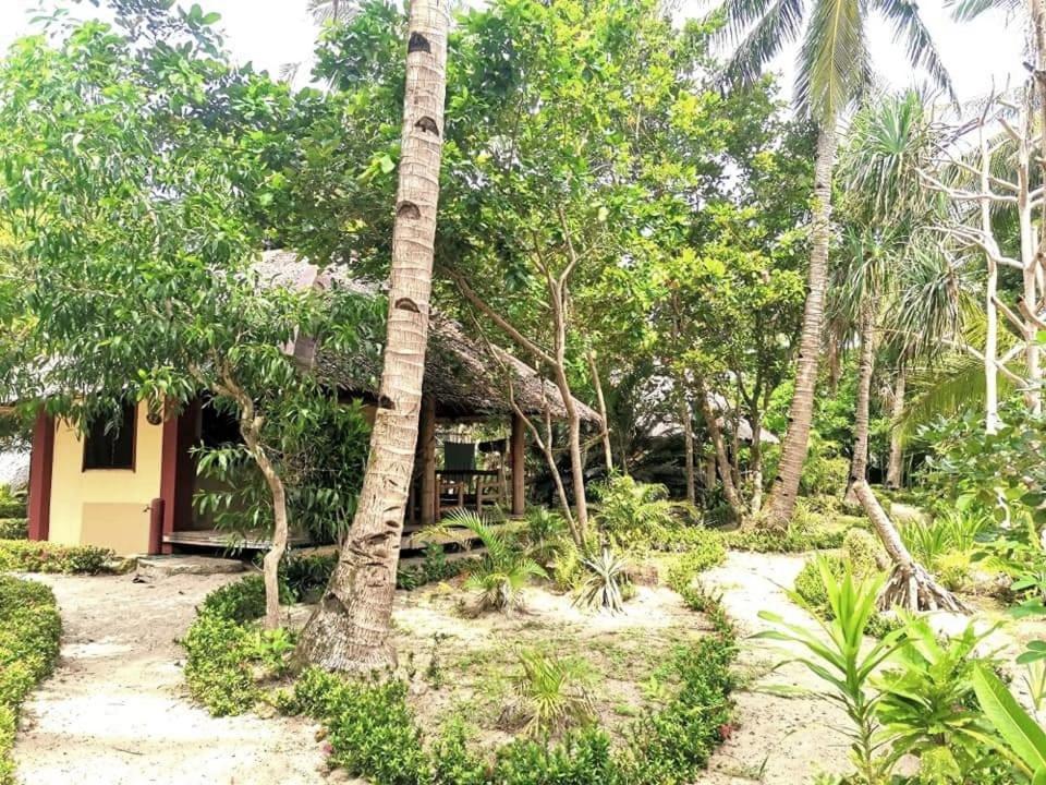 Sulu Sunset Beach Resort Nauhang Bagian luar foto