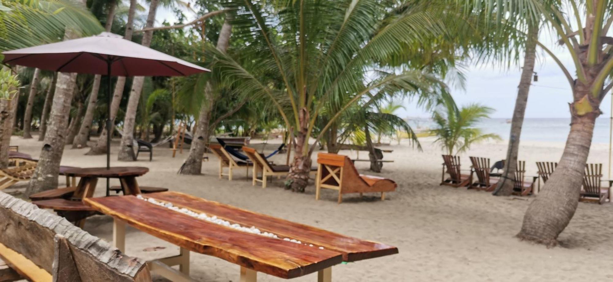 Sulu Sunset Beach Resort Nauhang Bagian luar foto